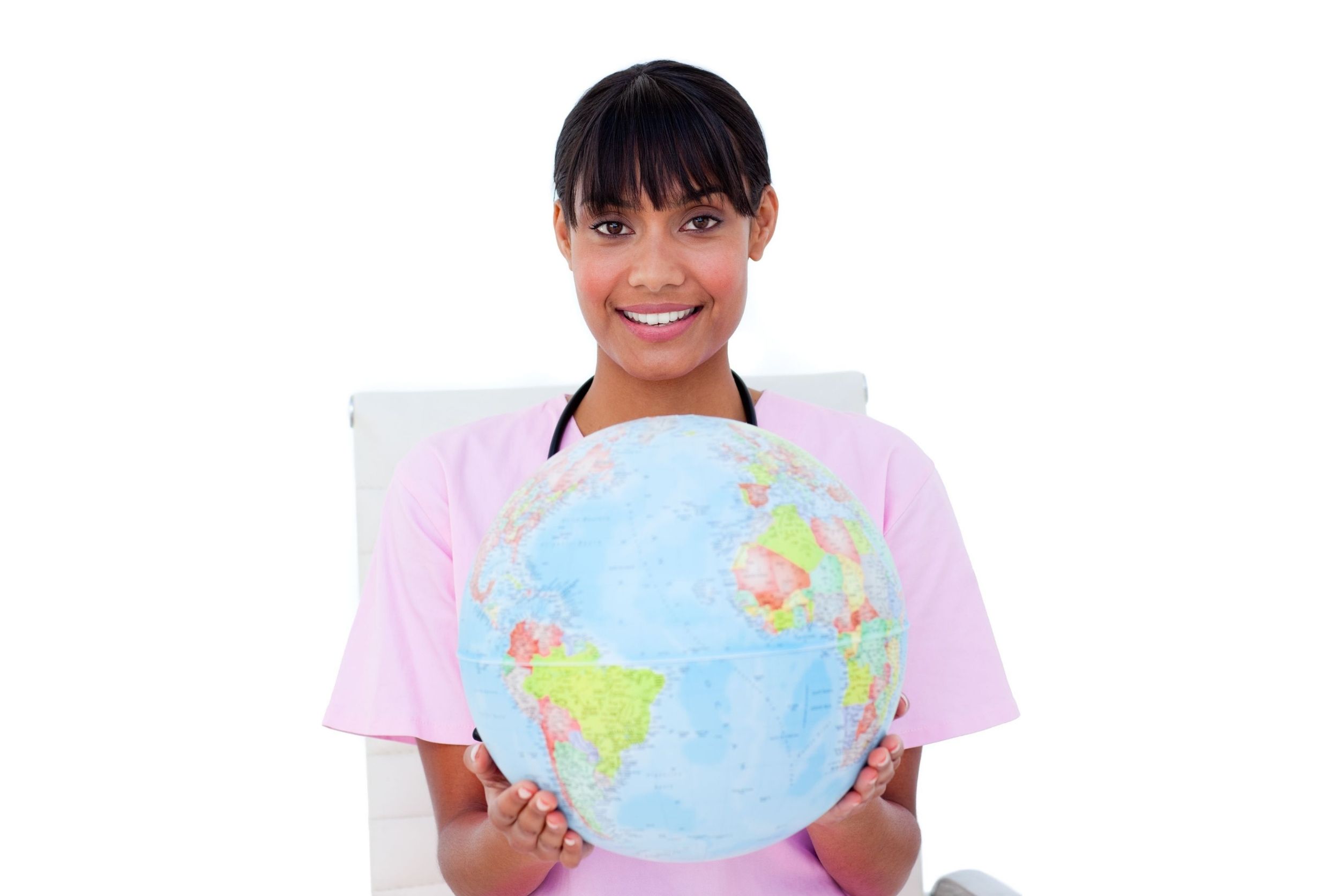 nurse who chose a travel nursing career holding a globe