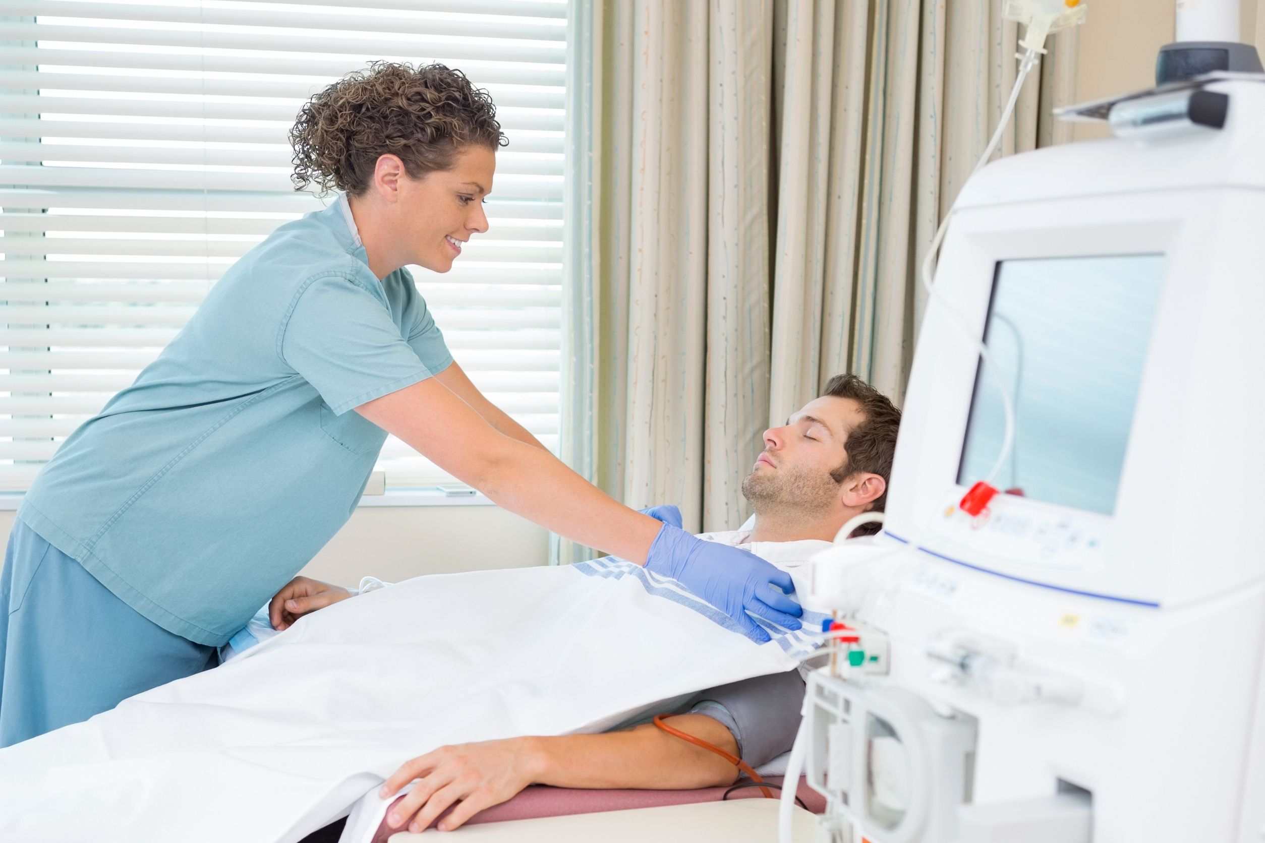 dialysis nurse covering patient with blanket, dialysis nurses duties